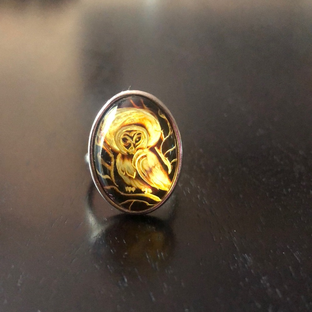Sterling silver carved amber owl ring